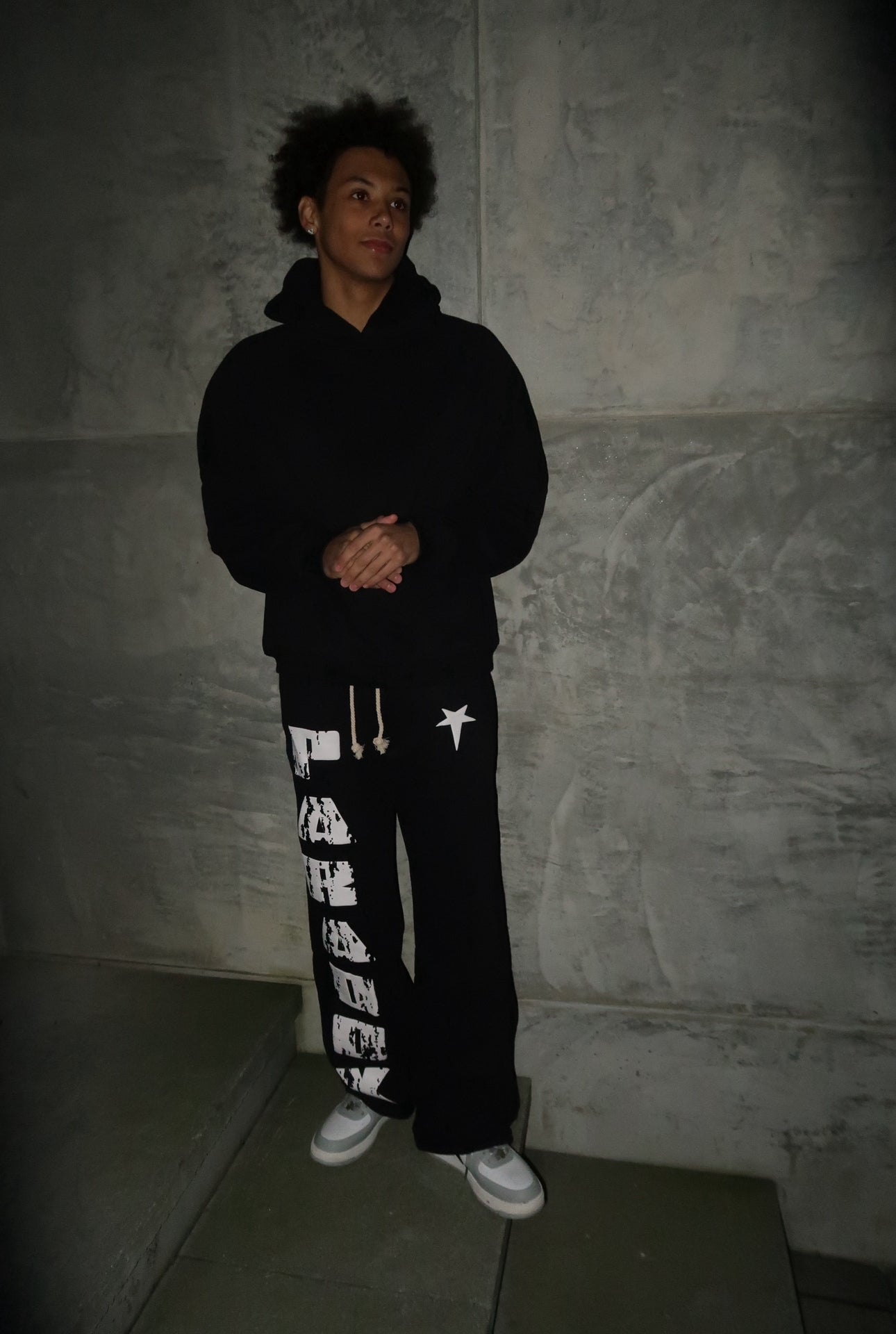 black sweatsuit