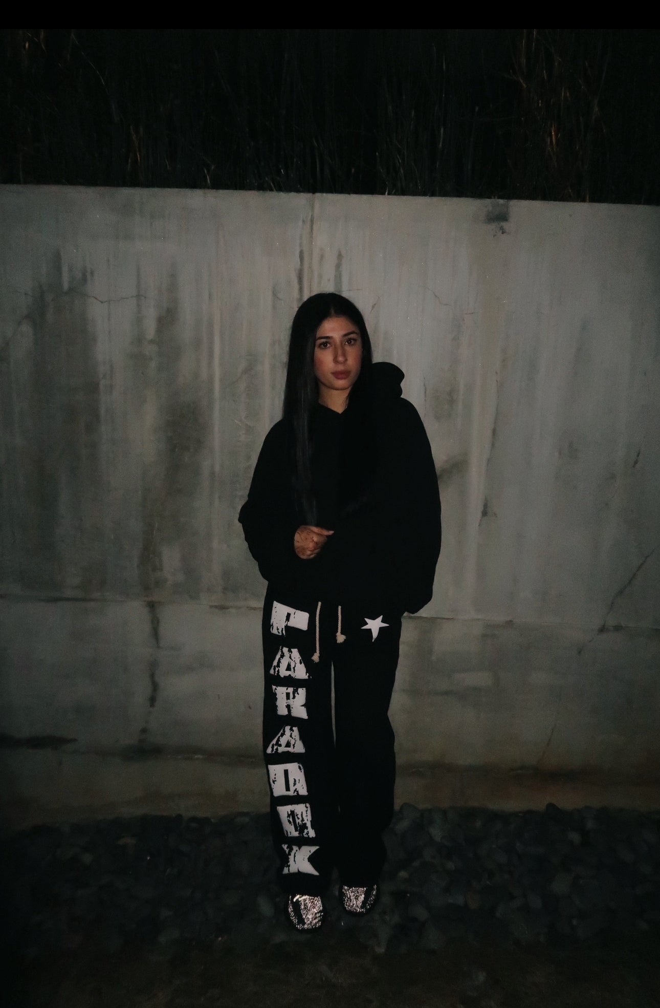 black sweatsuit